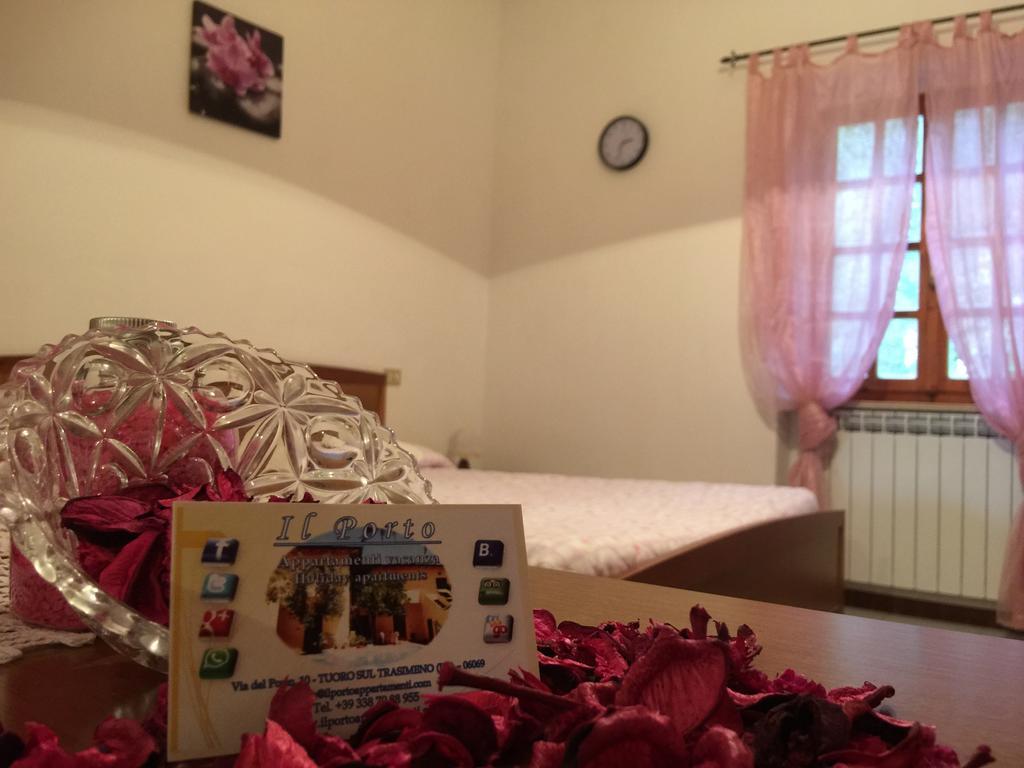 Aparthotel Il Porto Tuoro sul Trasimeno Pokoj fotografie
